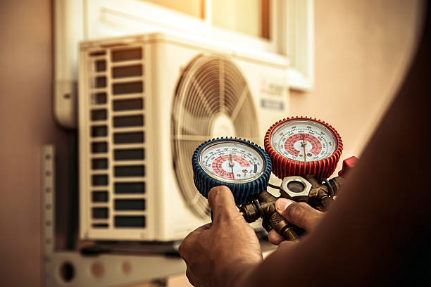Professional Heat Pump Repair technician working in Clinton, MD